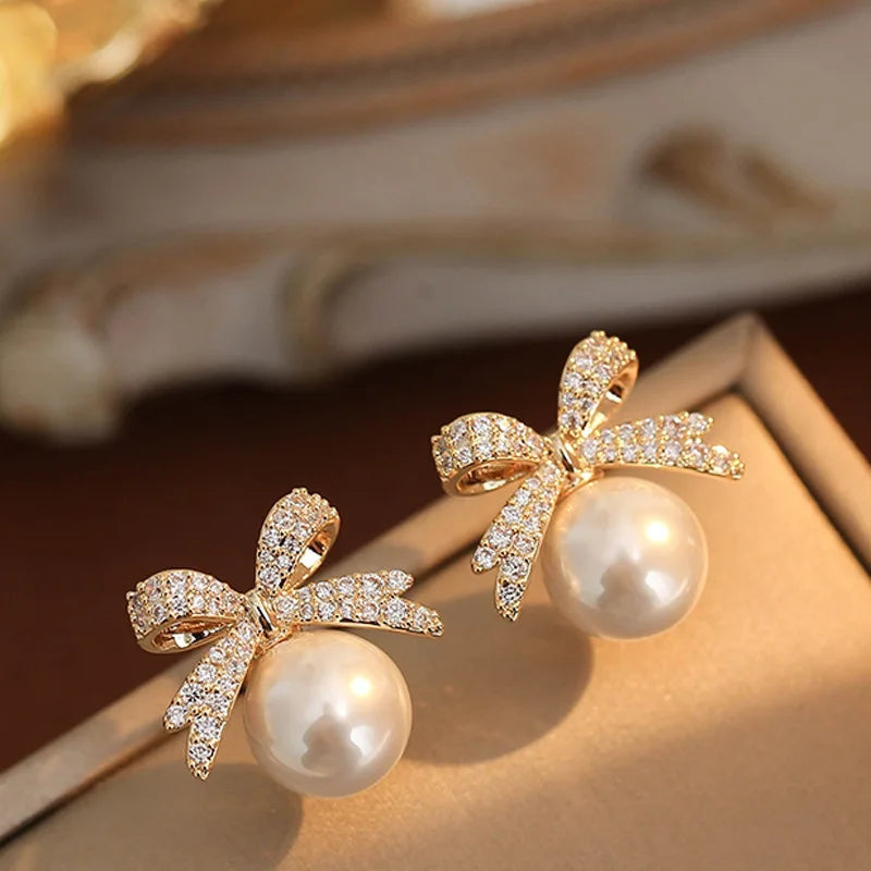 Rhinestone Bow Pearl Studs