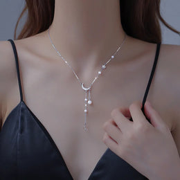 Sterling Star Moon Necklace