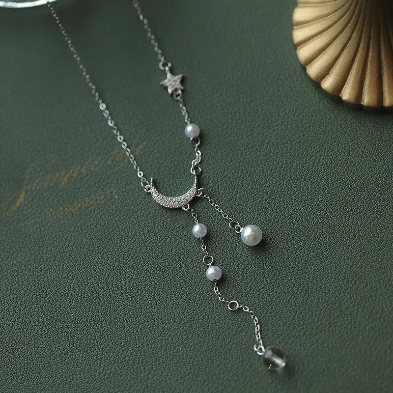 Sterling Star Moon Necklace