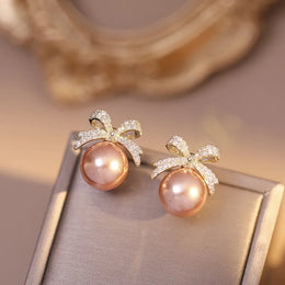 Rhinestone Bow Pearl Studs