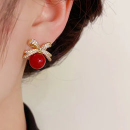 Rhinestone Bow Pearl Studs